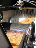 Mill for crushing and washing agave heads
