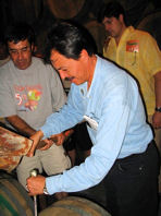 Carlos opens the barrel of 5-year-old a�ejo