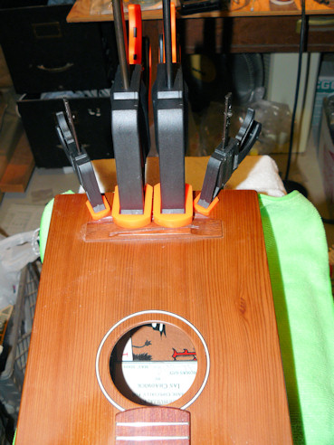Cigar box uke clamped